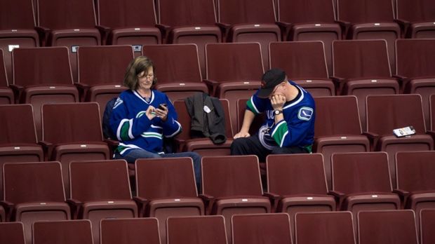 Dejected Vancouver Canucks fans.